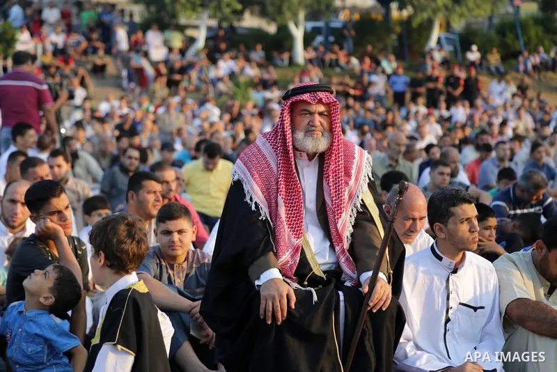 Palestinian muslims attend the prayer of Eid al-Adha or the feast of sacrifice in Gaza city, on September 1, 2017. Muslims around the world are celebrating Eid al-Adha, the "Feast of Sacrifice", which marks the end of th...
