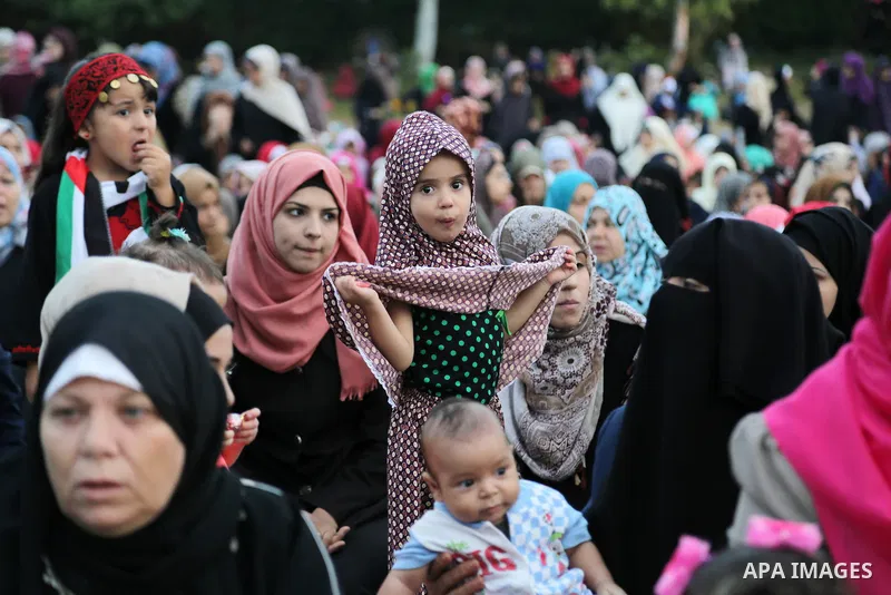 Palestinian muslims attend the prayer of Eid al-Adha or the feast of sacrifice in Gaza city, on September 1, 2017. Muslims around the world are celebrating Eid al-Adha, the "Feast of Sacrifice", which marks the end of th...