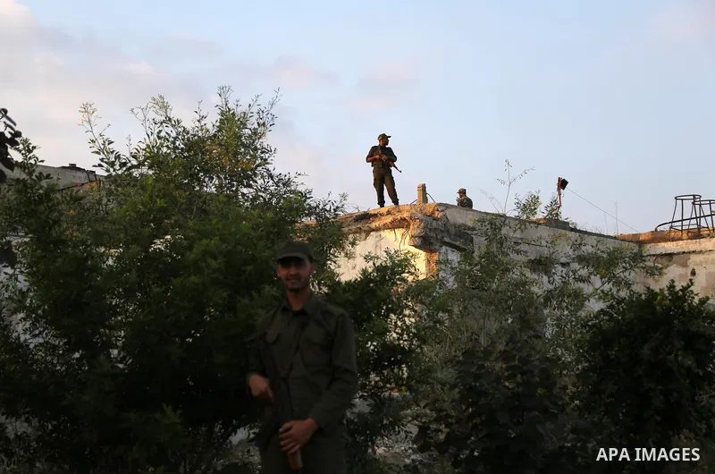Members of Palestinian security forces in Gaza strip stand guard during the prayer of Eid al-Adha or the feast of sacrifice in Gaza city, on September 1, 2017. Muslims around the world are celebrating Eid al-Adha, the "F...