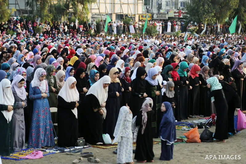 Palestinian muslims pray on the first day of of Eid al-Adha or the feast of sacrifice in Gaza city, on September 1, 2017. Muslims around the world are celebrating Eid al-Adha, the "Feast of Sacrifice", which marks the en...
