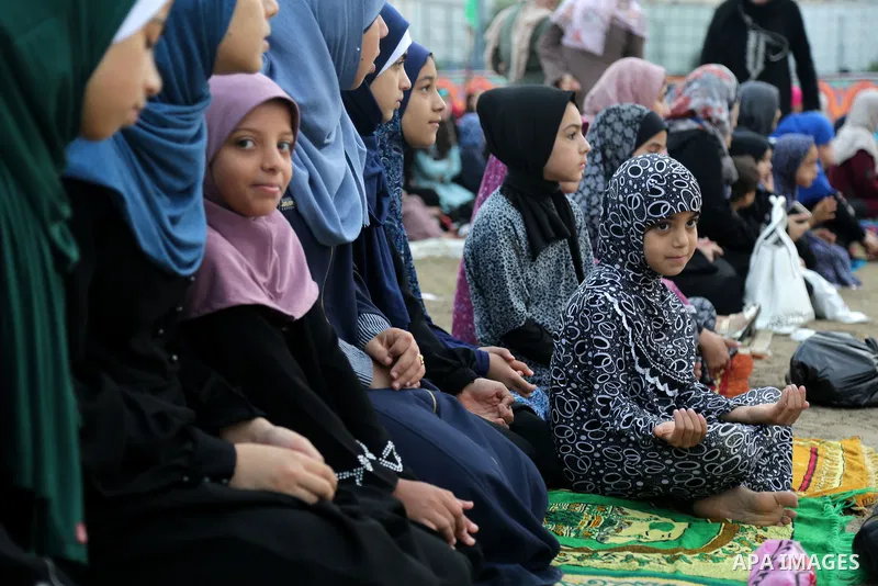 Palestinian muslims attend the prayer of Eid al-Adha or the feast of sacrifice in Gaza city, on September 1, 2017. Muslims around the world are celebrating Eid al-Adha, the "Feast of Sacrifice", which marks the end of th...
