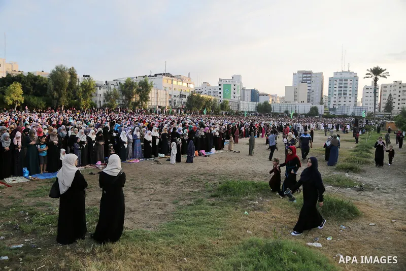 Palestinian muslims pray on the first day of of Eid al-Adha or the feast of sacrifice in Gaza city, on September 1, 2017. Muslims around the world are celebrating Eid al-Adha, the "Feast of Sacrifice", which marks the en...