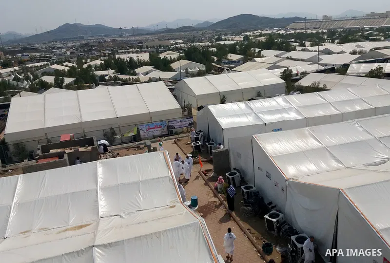 Muslim pilgrims rest near Mount Arafat, also known as Jabal al-Rahma (Mount of Mercy), southeast of the Saudi holy city of Mecca, on Arafat Day which is the climax of the Hajj pilgrimage early on August 31, 2017. Arafat...