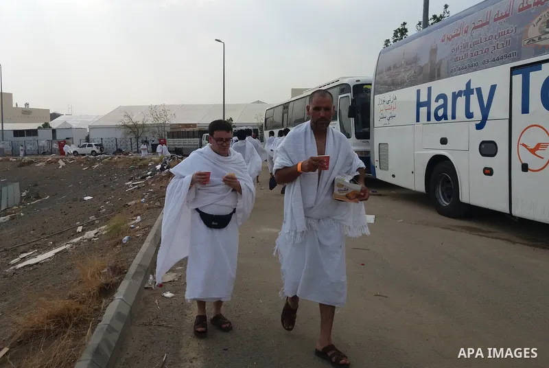 Muslim pilgrims rest near Mount Arafat, also known as Jabal al-Rahma (Mount of Mercy), southeast of the Saudi holy city of Mecca, on Arafat Day which is the climax of the Hajj pilgrimage early on August 31, 2017. Arafat...