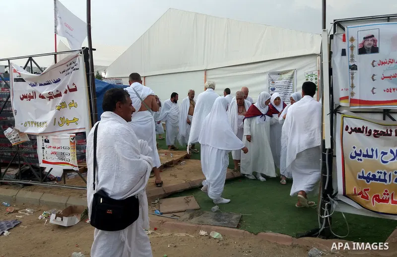 Muslim pilgrims rest near Mount Arafat, also known as Jabal al-Rahma (Mount of Mercy), southeast of the Saudi holy city of Mecca, on Arafat Day which is the climax of the Hajj pilgrimage early on August 31, 2017. Arafat...