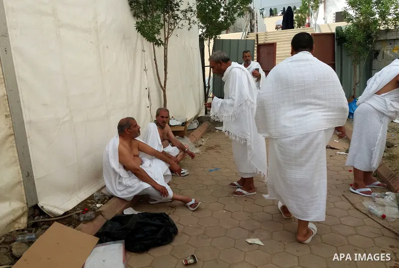 Muslim pilgrims rest near Mount Arafat, also known as Jabal al-Rahma (Mount of Mercy), southeast of the Saudi holy city of Mecca, on Arafat Day which is the climax of the Hajj pilgrimage early on August 31, 2017. Arafat...