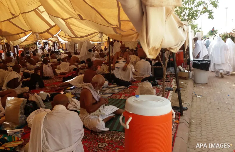 Muslim pilgrims rest near Mount Arafat, also known as Jabal al-Rahma (Mount of Mercy), southeast of the Saudi holy city of Mecca, on Arafat Day which is the climax of the Hajj pilgrimage early on August 31, 2017. Arafat...
