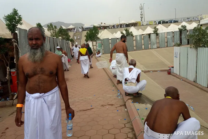 Muslim pilgrims rest near Mount Arafat, also known as Jabal al-Rahma (Mount of Mercy), southeast of the Saudi holy city of Mecca, on Arafat Day which is the climax of the Hajj pilgrimage early on August 31, 2017. Arafat...