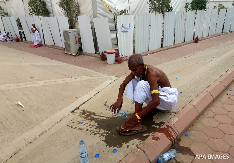 Muslim pilgrims rest near Mount Arafat, also known as Jabal al-Rahma (Mount of Mercy), southeast of the Saudi holy city of Mecca, on Arafat Day which is the climax of the Hajj pilgrimage early on August 31, 2017. Arafat...