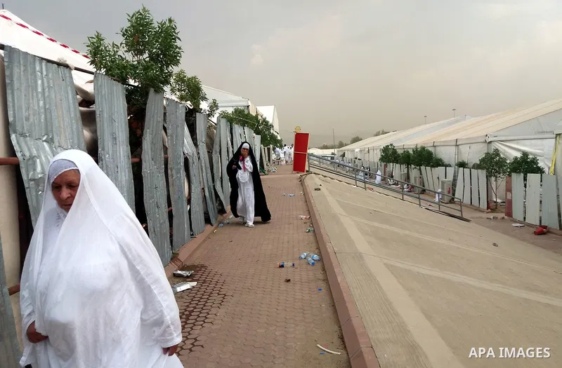 Muslim pilgrims rest near Mount Arafat, also known as Jabal al-Rahma (Mount of Mercy), southeast of the Saudi holy city of Mecca, on Arafat Day which is the climax of the Hajj pilgrimage early on August 31, 2017. Arafat...