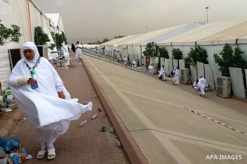 Muslim pilgrims rest near Mount Arafat, also known as Jabal al-Rahma (Mount of Mercy), southeast of the Saudi holy city of Mecca, on Arafat Day which is the climax of the Hajj pilgrimage early on August 31, 2017. Arafat...