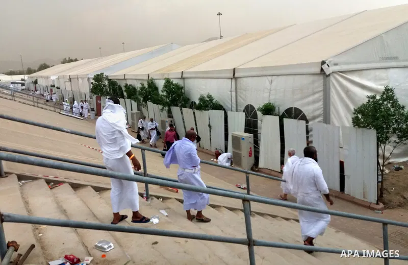 Muslim pilgrims rest near Mount Arafat, also known as Jabal al-Rahma (Mount of Mercy), southeast of the Saudi holy city of Mecca, on Arafat Day which is the climax of the Hajj pilgrimage early on August 31, 2017. Arafat...