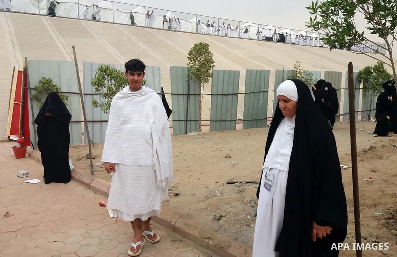 Muslim pilgrims rest near Mount Arafat, also known as Jabal al-Rahma (Mount of Mercy), southeast of the Saudi holy city of Mecca, on Arafat Day which is the climax of the Hajj pilgrimage early on August 31, 2017. Arafat...