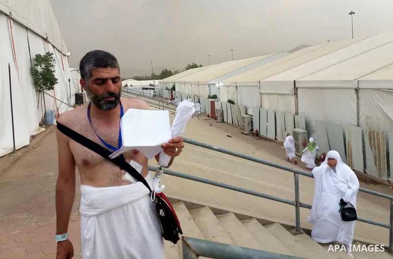 Muslim pilgrims rest near Mount Arafat, also known as Jabal al-Rahma (Mount of Mercy), southeast of the Saudi holy city of Mecca, on Arafat Day which is the climax of the Hajj pilgrimage early on August 31, 2017. Arafat...