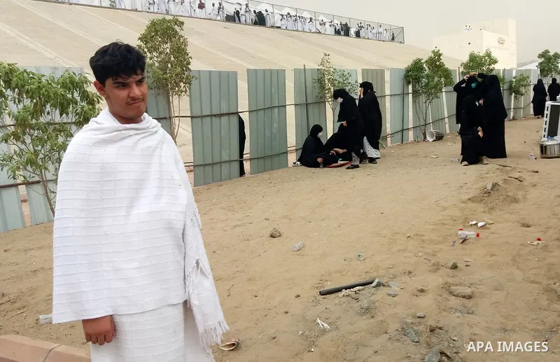Muslim pilgrims rest near Mount Arafat, also known as Jabal al-Rahma (Mount of Mercy), southeast of the Saudi holy city of Mecca, on Arafat Day which is the climax of the Hajj pilgrimage early on August 31, 2017. Arafat...
