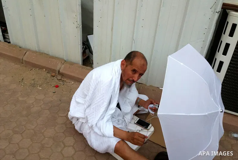 Muslim pilgrims rest near Mount Arafat, also known as Jabal al-Rahma (Mount of Mercy), southeast of the Saudi holy city of Mecca, on Arafat Day which is the climax of the Hajj pilgrimage early on August 31, 2017. Arafat...
