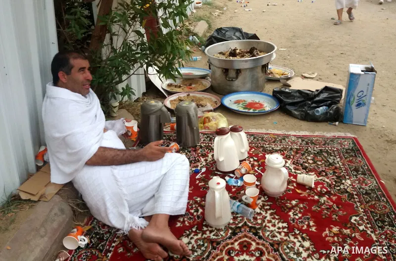 Muslim pilgrims rest near Mount Arafat, also known as Jabal al-Rahma (Mount of Mercy), southeast of the Saudi holy city of Mecca, on Arafat Day which is the climax of the Hajj pilgrimage early on August 31, 2017. Arafat...