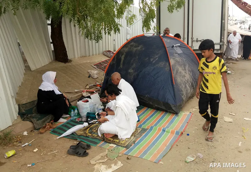 Muslim pilgrims rest near Mount Arafat, also known as Jabal al-Rahma (Mount of Mercy), southeast of the Saudi holy city of Mecca, on Arafat Day which is the climax of the Hajj pilgrimage early on August 31, 2017. Arafat...