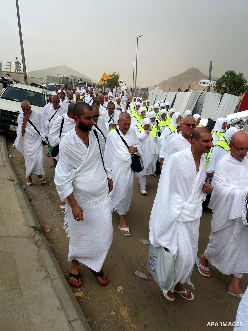 Muslim pilgrims walk near Mount Arafat, also known as Jabal al-Rahma (Mount of Mercy), southeast of the Saudi holy city of Mecca, on Arafat Day which is the climax of the Hajj pilgrimage early on August 31, 2017. Arafat...