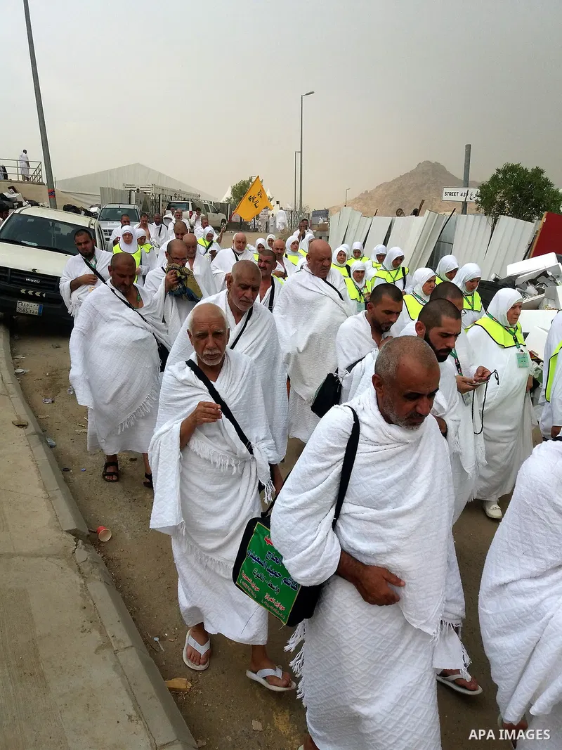 Muslim pilgrims walk near Mount Arafat, also known as Jabal al-Rahma (Mount of Mercy), southeast of the Saudi holy city of Mecca, on Arafat Day which is the climax of the Hajj pilgrimage early on August 31, 2017. Arafat...