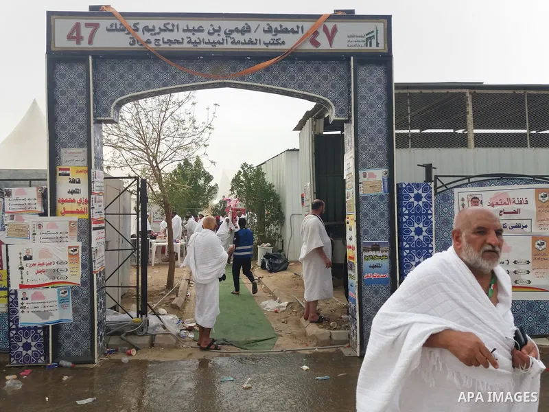 Muslim pilgrims walk near Mount Arafat, also known as Jabal al-Rahma (Mount of Mercy), southeast of the Saudi holy city of Mecca, on Arafat Day which is the climax of the Hajj pilgrimage early on August 31, 2017. Arafat...