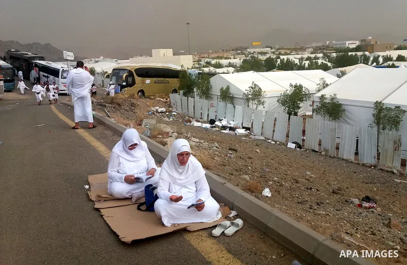 Muslim pilgrims rest near Mount Arafat, also known as Jabal al-Rahma (Mount of Mercy), southeast of the Saudi holy city of Mecca, on Arafat Day which is the climax of the Hajj pilgrimage early on August 31, 2017. Arafat...