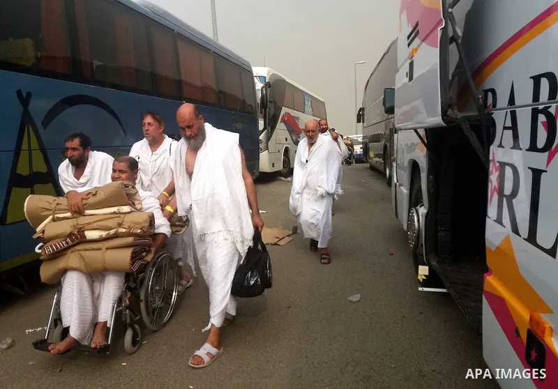 Muslim pilgrims walk near Mount Arafat, also known as Jabal al-Rahma (Mount of Mercy), southeast of the Saudi holy city of Mecca, on Arafat Day which is the climax of the Hajj pilgrimage early on August 31, 2017. Arafat...