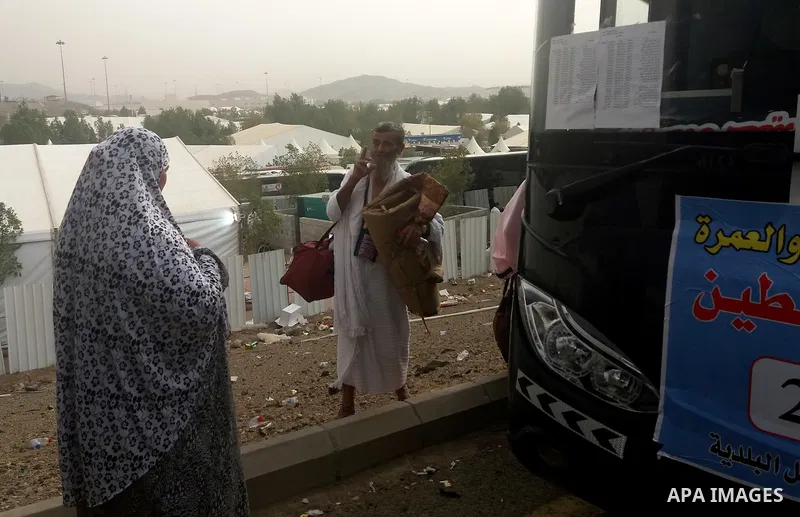 Muslim pilgrims walk near Mount Arafat, also known as Jabal al-Rahma (Mount of Mercy), southeast of the Saudi holy city of Mecca, on Arafat Day which is the climax of the Hajj pilgrimage early on August 31, 2017. Arafat...