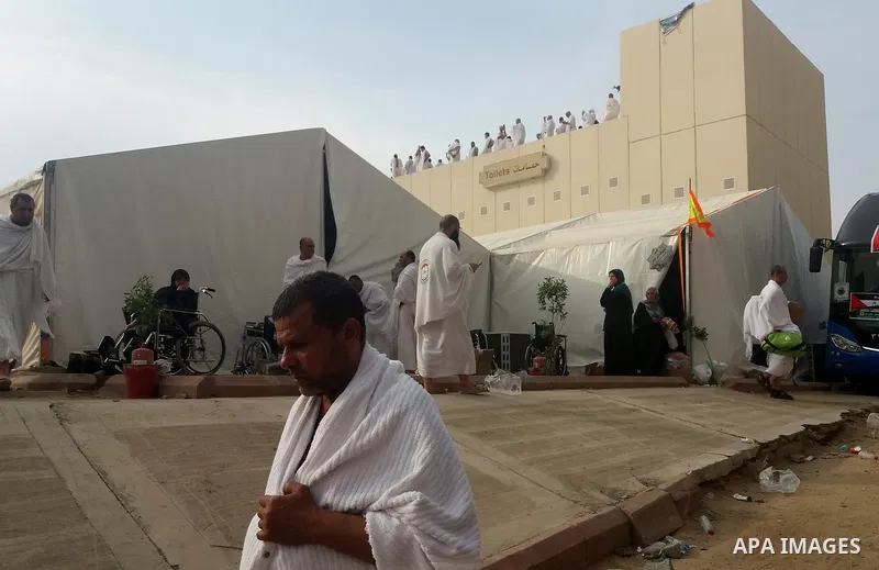 Muslim pilgrims walk near Mount Arafat, also known as Jabal al-Rahma (Mount of Mercy), southeast of the Saudi holy city of Mecca, on Arafat Day which is the climax of the Hajj pilgrimage early on August 31, 2017. Arafat...