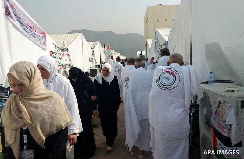 Muslim pilgrims rest near Mount Arafat, also known as Jabal al-Rahma (Mount of Mercy), southeast of the Saudi holy city of Mecca, on Arafat Day which is the climax of the Hajj pilgrimage early on August 31, 2017. Arafat...
