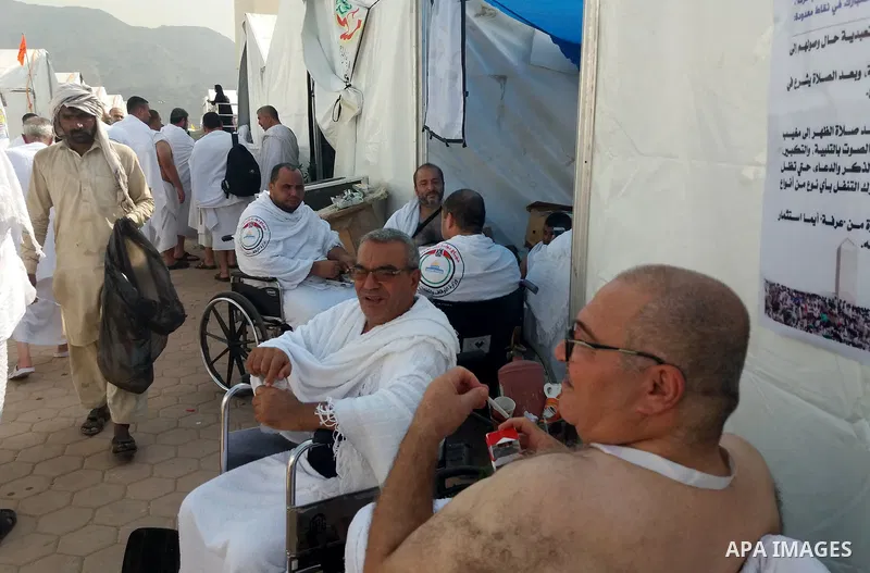 Muslim pilgrims rest near Mount Arafat, also known as Jabal al-Rahma (Mount of Mercy), southeast of the Saudi holy city of Mecca, on Arafat Day which is the climax of the Hajj pilgrimage early on August 31, 2017. Arafat...
