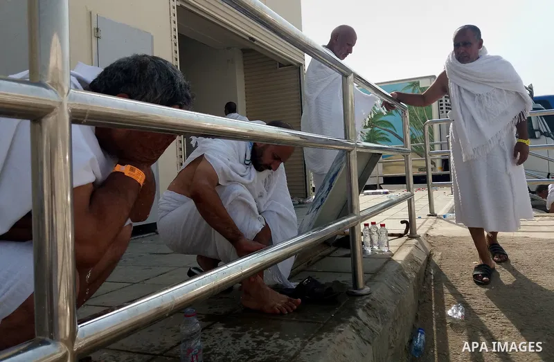 Muslim pilgrims rest near Mount Arafat, also known as Jabal al-Rahma (Mount of Mercy), southeast of the Saudi holy city of Mecca, on Arafat Day which is the climax of the Hajj pilgrimage early on August 31, 2017. Arafat...