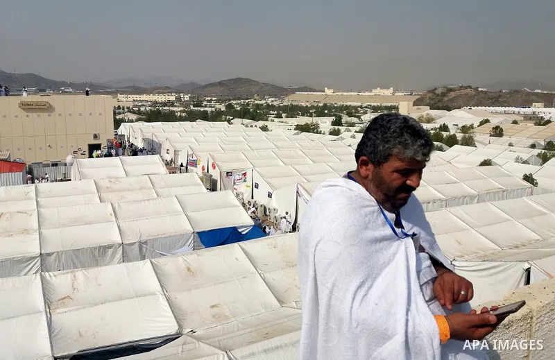 Muslim pilgrims rest near Mount Arafat, also known as Jabal al-Rahma (Mount of Mercy), southeast of the Saudi holy city of Mecca, on Arafat Day which is the climax of the Hajj pilgrimage early on August 31, 2017. Arafat...