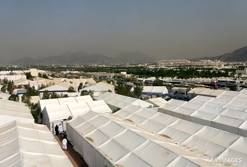 Muslim pilgrims rest near Mount Arafat, also known as Jabal al-Rahma (Mount of Mercy), southeast of the Saudi holy city of Mecca, on Arafat Day which is the climax of the Hajj pilgrimage early on August 31, 2017. Arafat...