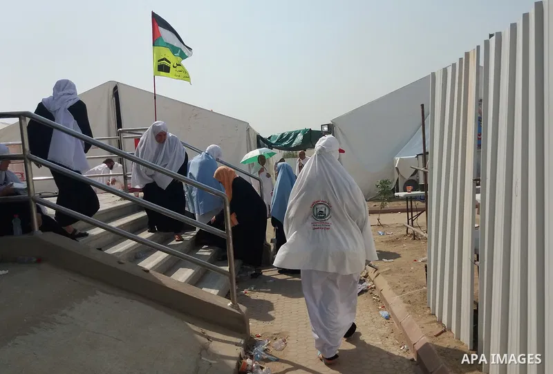 Muslim pilgrims rest near Mount Arafat, also known as Jabal al-Rahma (Mount of Mercy), southeast of the Saudi holy city of Mecca, on Arafat Day which is the climax of the Hajj pilgrimage early on August 31, 2017. Arafat...