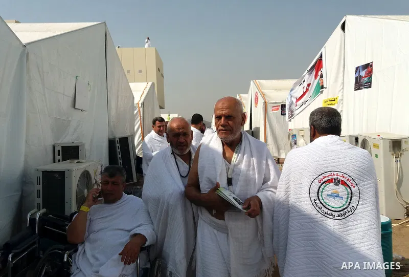 Muslim pilgrims rest near Mount Arafat, also known as Jabal al-Rahma (Mount of Mercy), southeast of the Saudi holy city of Mecca, on Arafat Day which is the climax of the Hajj pilgrimage early on August 31, 2017. Arafat...