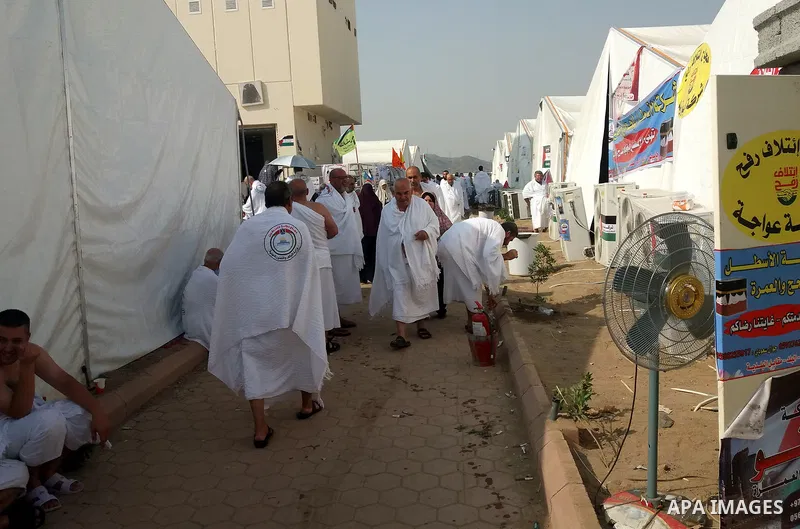 Muslim pilgrims rest near Mount Arafat, also known as Jabal al-Rahma (Mount of Mercy), southeast of the Saudi holy city of Mecca, on Arafat Day which is the climax of the Hajj pilgrimage early on August 31, 2017. Arafat...