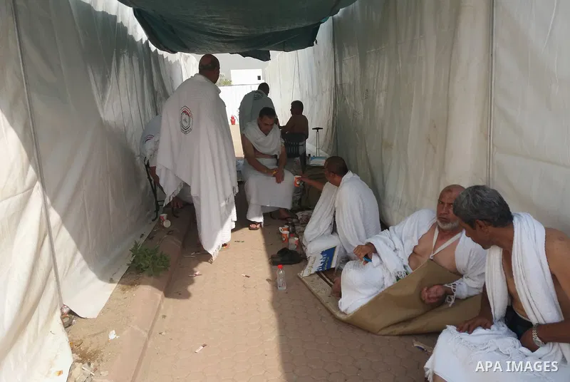 Muslim pilgrims rest near Mount Arafat, also known as Jabal al-Rahma (Mount of Mercy), southeast of the Saudi holy city of Mecca, on Arafat Day which is the climax of the Hajj pilgrimage early on August 31, 2017. Arafat...