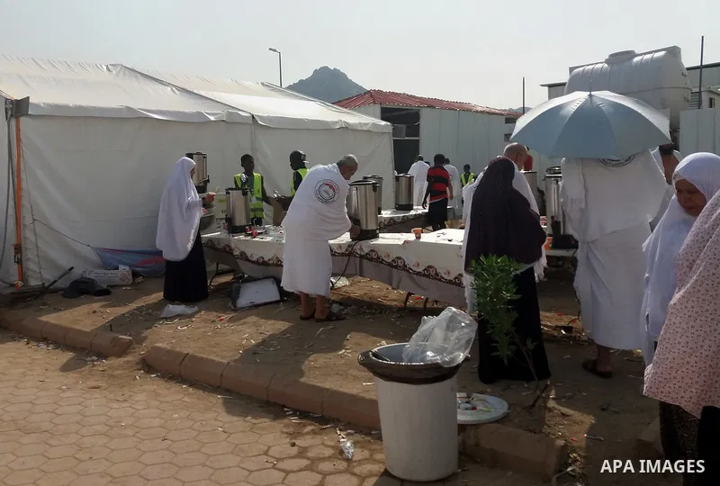 Muslim pilgrims rest near Mount Arafat, also known as Jabal al-Rahma (Mount of Mercy), southeast of the Saudi holy city of Mecca, on Arafat Day which is the climax of the Hajj pilgrimage early on August 31, 2017. Arafat...