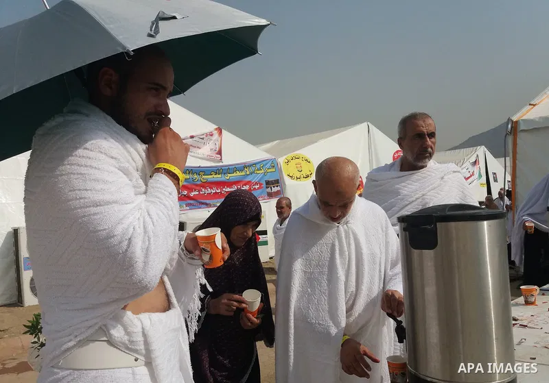 Muslim pilgrims rest near Mount Arafat, also known as Jabal al-Rahma (Mount of Mercy), southeast of the Saudi holy city of Mecca, on Arafat Day which is the climax of the Hajj pilgrimage early on August 31, 2017. Arafat...