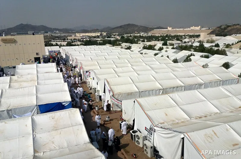 Muslim pilgrims rest near Mount Arafat, also known as Jabal al-Rahma (Mount of Mercy), southeast of the Saudi holy city of Mecca, on Arafat Day which is the climax of the Hajj pilgrimage early on August 31, 2017. Arafat...