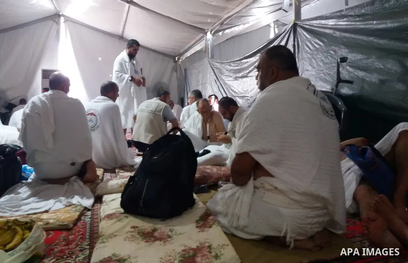 Muslim pilgrims rest near Mount Arafat, also known as Jabal al-Rahma (Mount of Mercy), southeast of the Saudi holy city of Mecca, on Arafat Day which is the climax of the Hajj pilgrimage early on August 31, 2017. Arafat...