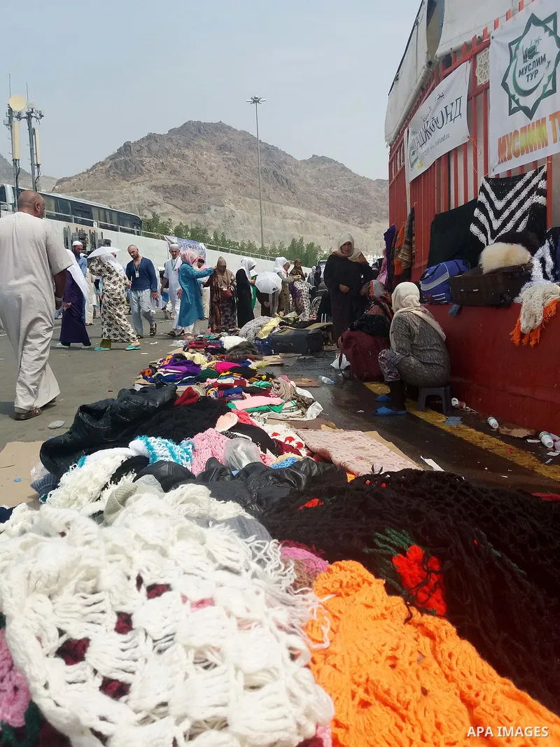 Muslim pilgrims shop on the secund day of Eid al-Adha at a market near the holy city of Mecca, on September 2, 2017. Muslims around the world are celebrating Eid al-Adha, the "Feast of Sacrifice", which marks the end of...