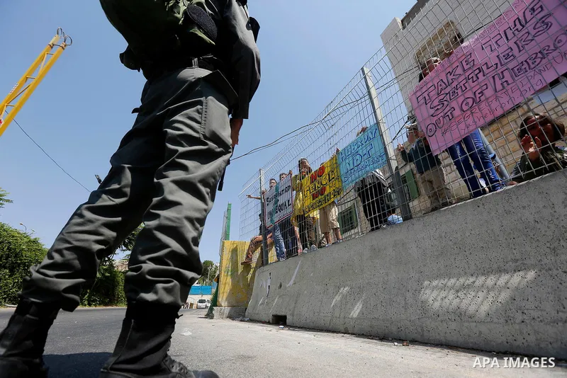 An Israeli border policeman stand guard during a demonstration organised by young Palestinians in Hebron on September 3, 2017, against a recent decision by Israel to boost the powers of the settlers in the occupied West...