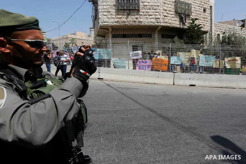 An Israeli border policeman stand guard during a demonstration organised by young Palestinians in Hebron on September 3, 2017, against a recent decision by Israel to boost the powers of the settlers in the occupied West...