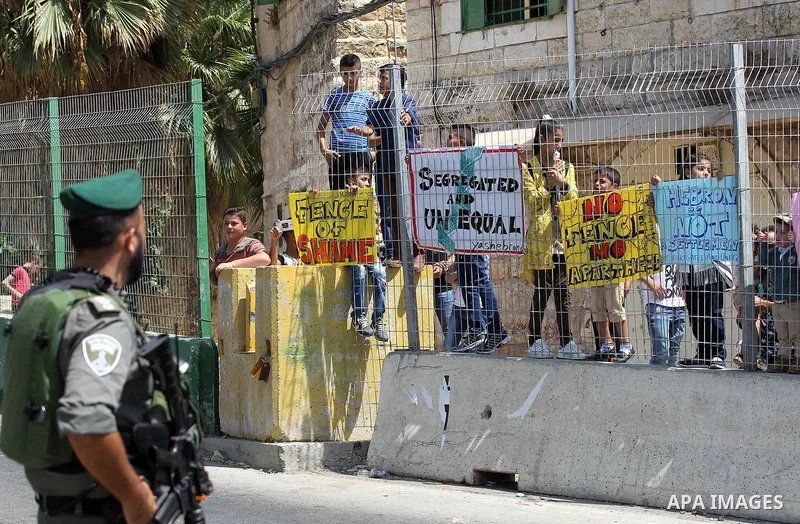 An Israeli border policeman stand guard during a demonstration organised by young Palestinians in Hebron on September 3, 2017, against a recent decision by Israel to boost the powers of the settlers in the occupied West...