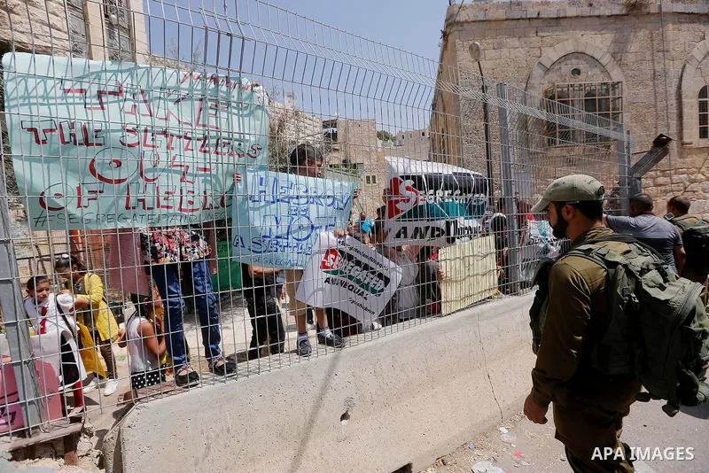 An Israeli border policeman stand guard during a demonstration organised by young Palestinians in Hebron on September 3, 2017, against a recent decision by Israel to boost the powers of the settlers in the occupied West...