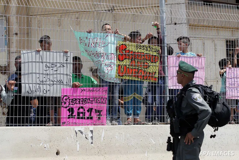 An Israeli border policeman stand guard during a demonstration organised by young Palestinians in Hebron on September 3, 2017, against a recent decision by Israel to boost the powers of the settlers in the occupied West...