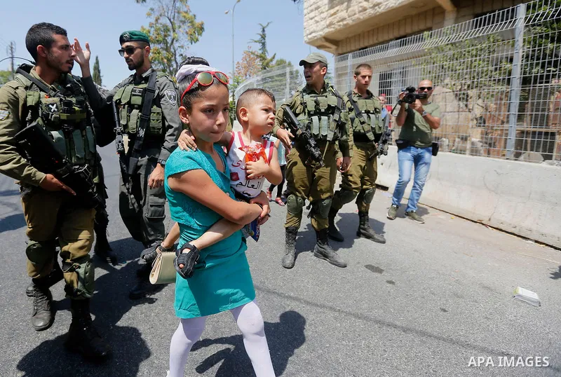 Israeli border policemen stand guard during a demonstration organised by young Palestinians in Hebron on September 3, 2017, against a recent decision by Israel to boost the powers of the settlers in the occupied West Ban...