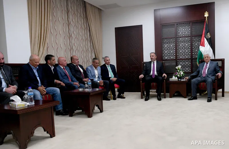 Palestinian President Mahmoud Abbas meets with official media staff, at his headquarters, in the West Bank city of Ramallah, on September 3, 2017. Photo by Osama Falah